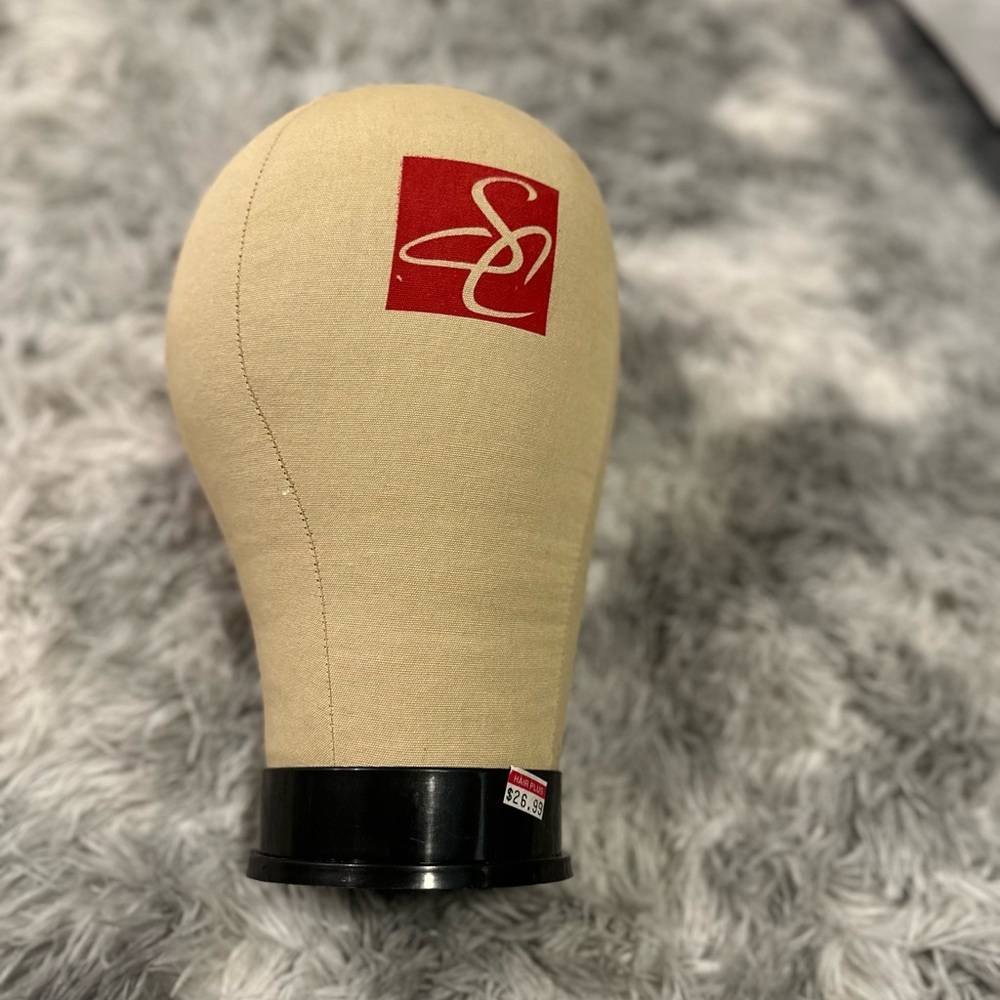 Beige Mannequin Head with Red Logo